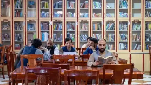 Afghanistan's rulers outlaw textbooks authored by women from the nation's colleges